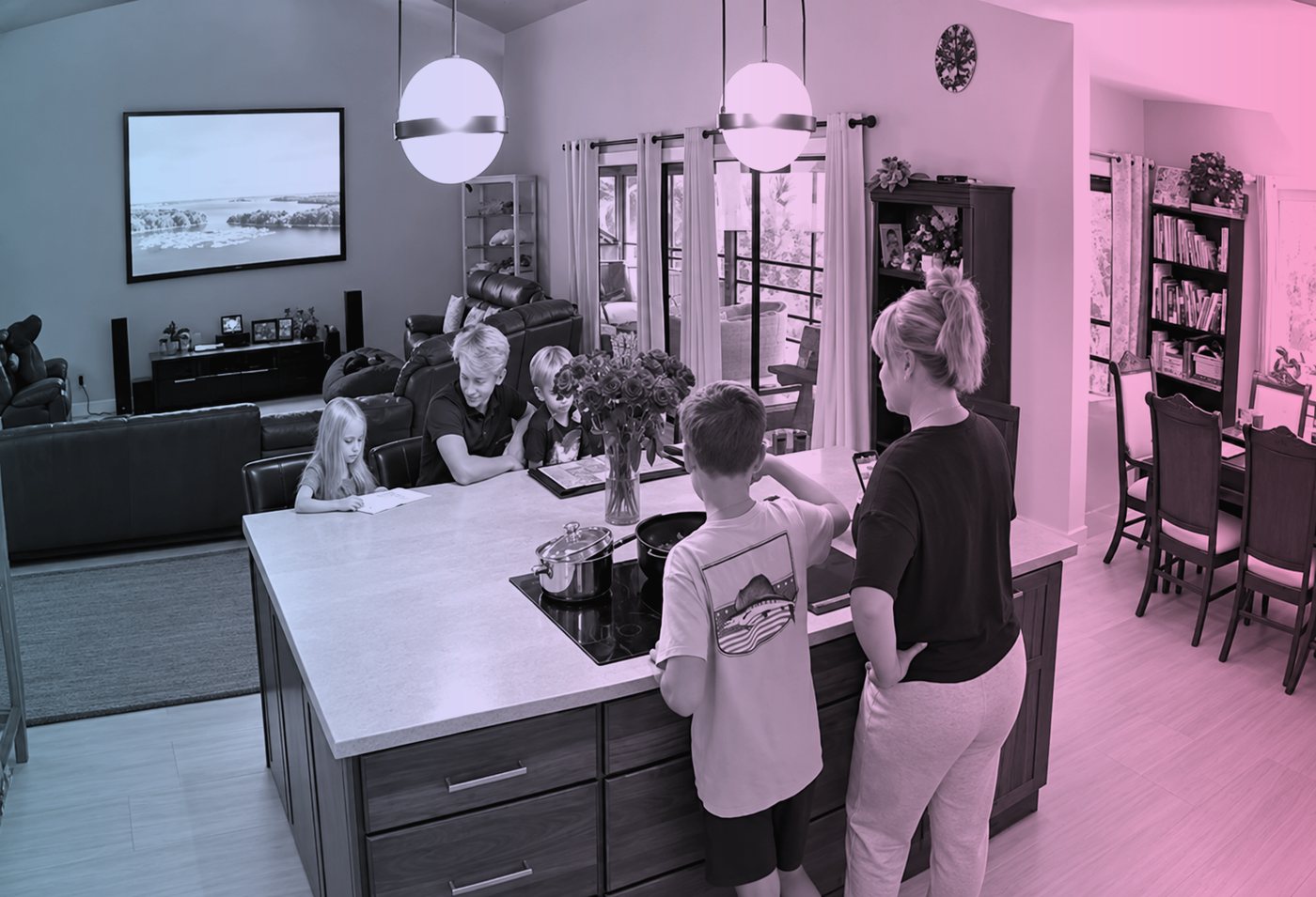 The family together around the kitchen counter
