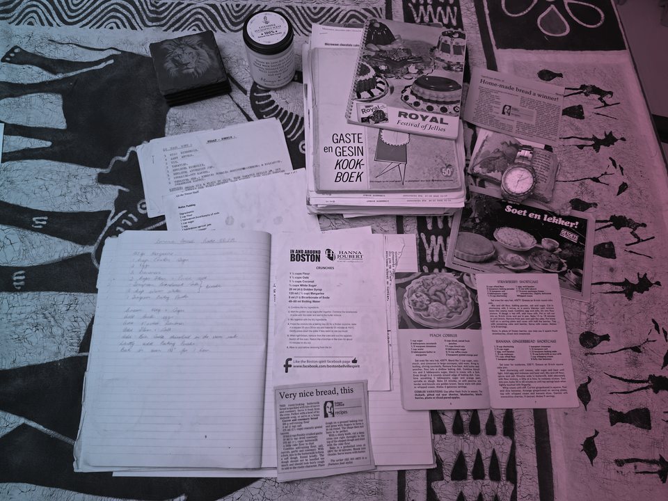 Treasured family recipe books, handwritten recipes and a watch